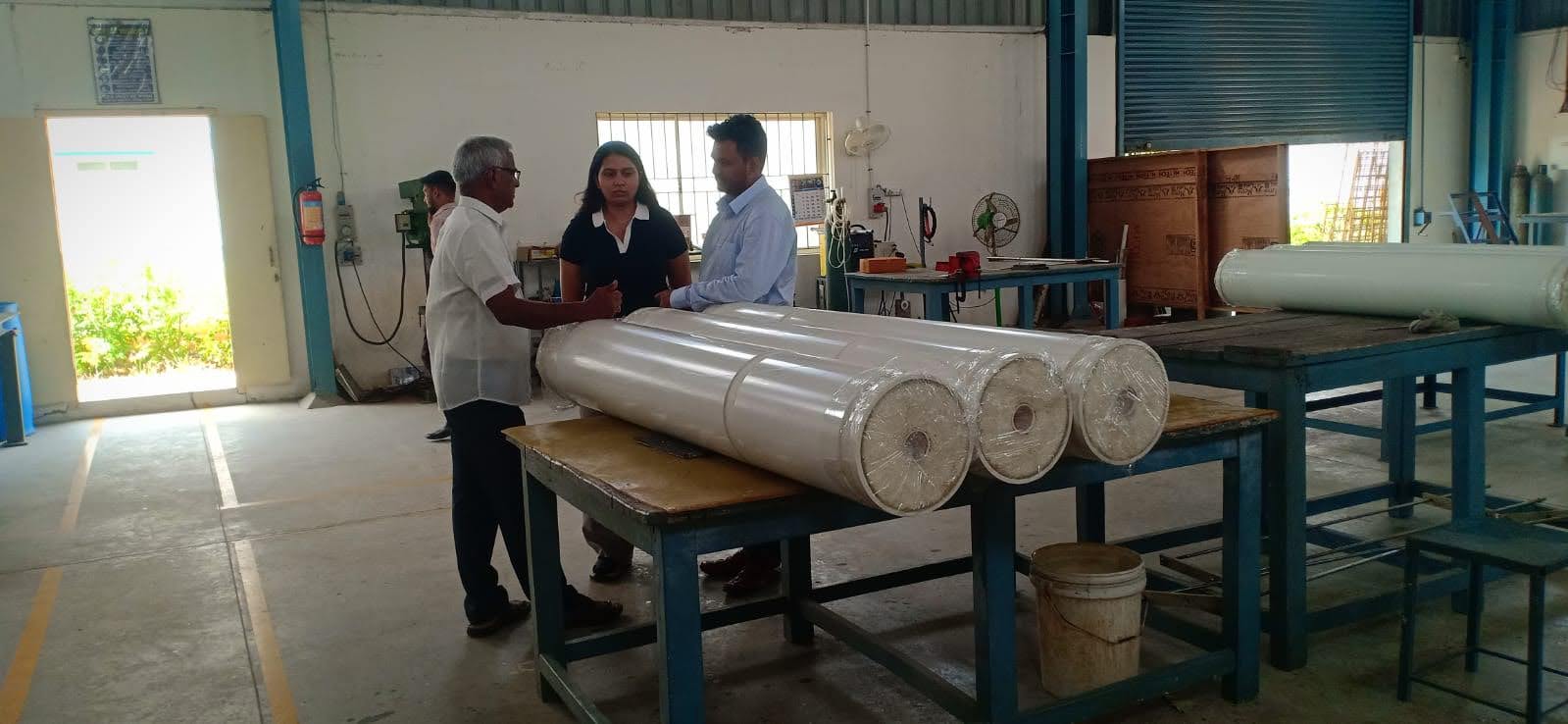 Team inspecting UF membrane cartridges